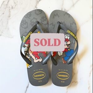 Havaianas Gray Flip Flops with Yellow Logo and Multicolor Graphic